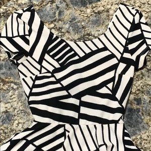 black and white midi-mini peplum dress with cutout